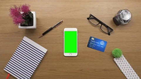 Overhead Top View Of woman Using Smartphone By Credit Card Stock Footage 79650696
