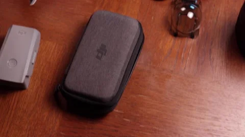 Overhead tracking shot of DJI Mavic Air 2 on a dining room table Stock Footage 138528658