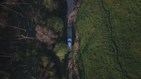 Overhead Tracking Shot of Pickup on Country Track Stock Footage 336562695