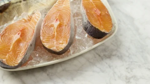 Overhead tracking shot of a tray of fresh fish on ice Stock Footage 87720711