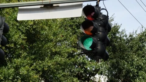 Overhead traffic light showing green for right of passage Stock Footage 153534110