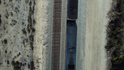 Overhead Train Passing Underneath Stock Footage 239575407