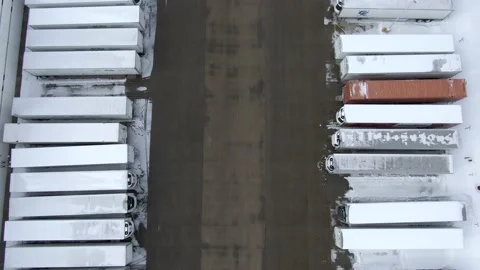 Overhead Trucks Lined up in Transportation Yard 库存影片 148354119