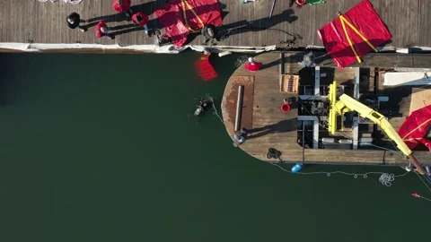 Overhead View Of 2 Divers Diving In Front Of work Barge. 4K Stock Footage 152423319