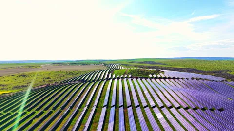 Overhead view of angled solar panels on grassy slope, Bulgaria Stock Footage 339008267