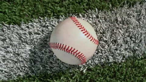 Overhead view of baseball sitting on the... | Stock Video | Pond5