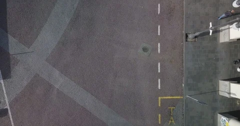 Overhead View Of Biker Cycling On The Road on early morning Stock Footage 108600261