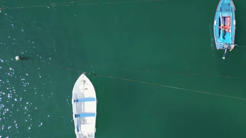 Overhead View Of Boats Floating In The Bay With Calm Waters In Summer. - aerial Stock Footage 249726629