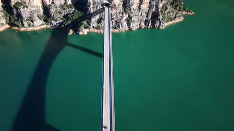 Overhead view of a bridge over a reservoir Stock Footage 344054431
