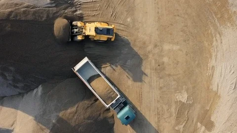 Overhead view of bulldozer in open air quarry Stock Footage 107382004