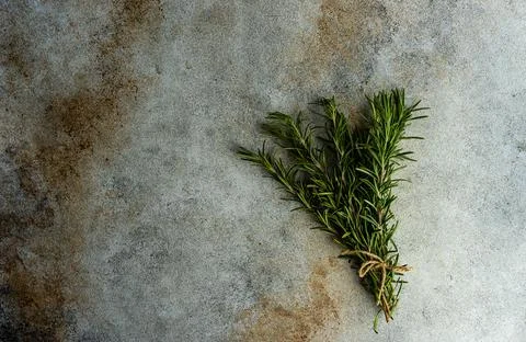 Overhead view of a bunch of rosemary on a table Stock Photos