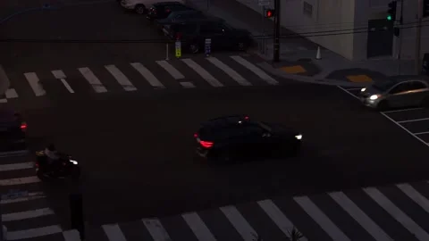 Overhead view of busy traffic junction in San Francisco during twilight Stock Footage 233897230