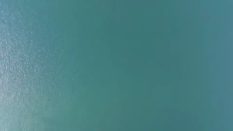 Overhead View Of Calm Blue Waters On A Sunny Day. - aerial Stock Footage 252268838