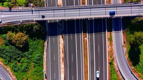 Overhead view of cars on a wide multi lane highway, Spain Stock Footage 344693701