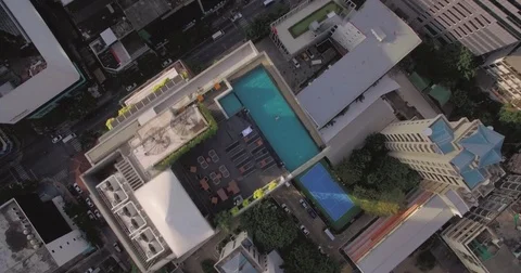 Overhead View of Central Bangkok and Rooftop Swimming Pool Stock Footage