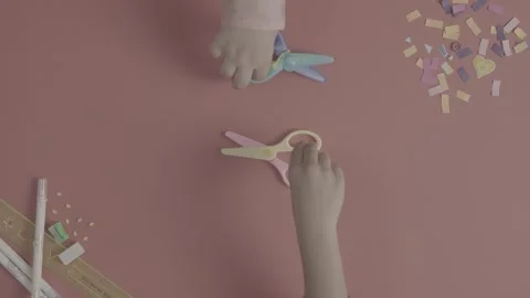 Overhead view of children playing with toy scissors on pink desk. Vídeo Stock 330155927