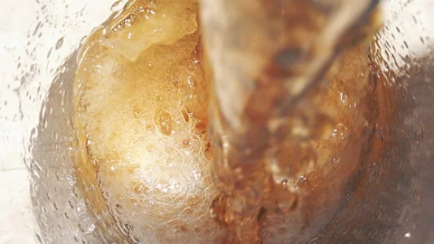 Overhead View of Cold Beer Pouring from Bottle into Glass Mug with Foam Vídeo Stock 335787921