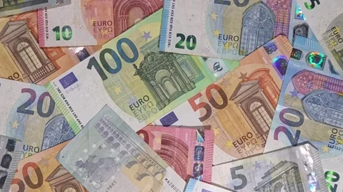 Overhead view of a collage of stacked euro banknotes, money background Stock Footage 336984416