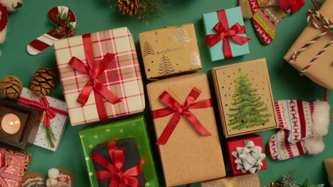 Overhead view of colorful gift boxes tied with red ribbons Christmas background Stock-Footage 251599726