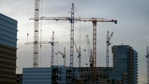 Overhead view of construction cranes in the city. 4K Stock Footage 123000051