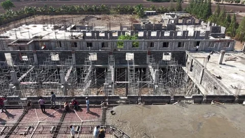 Overhead View of Construction Crew Casting Concrete Slab for Multi-Story Stock Footage 344036676