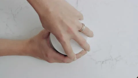 Overhead view, container of green drink powder opened, scooped slow motion Stock-Footage 193763853