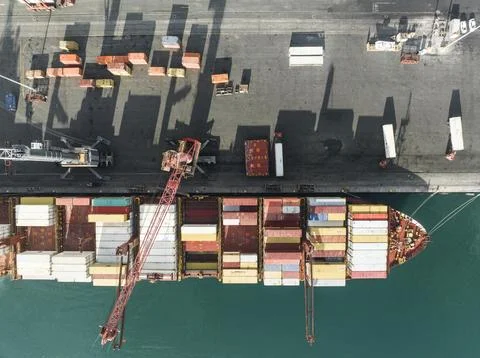 Overhead view of container vessel being loaded in Table Bay, Cape Town Stock Photos