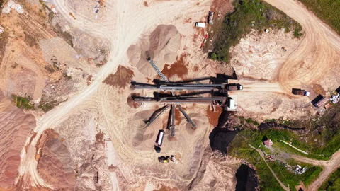 Overhead view of conveyor belt system at gravel quarry 動画素材 345153523