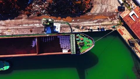 Overhead view of crane loading cargo ship, Bulgarian port Stock Footage 343844043