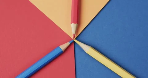 Overhead view of crayons on colourful ba... | Stock Video | Pond5