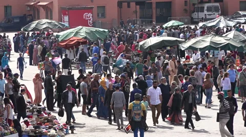 Overhead view of crowds passing through Jemaa El Fnaa in Marrakesh Morocco Stock Footage 62517470