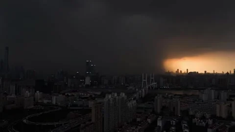 Overhead View of Dark Storm Clouds Engulfing Shanghai City at Sunset China Stock Footage 346335328