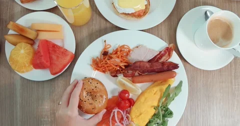 Overhead view of delicious breakfast spread with fresh fruits, Stock-Footage 315577017