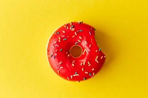 Overhead view of Delicious donut on colored background Stock Photos
