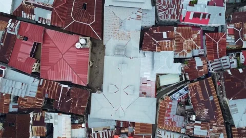 Overhead view of a dense urban area with rusty rooftops, showcasing the texture Stock Footage 318371096