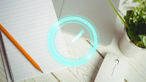An overhead view of a desk with various electronic devices, including a Stock Footage 327280356