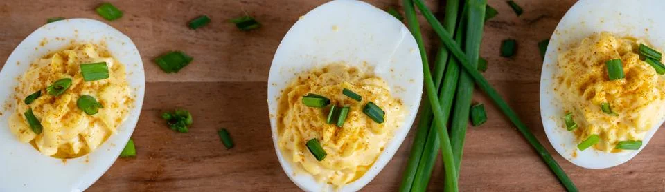 Overhead View of Deviled Eggs on a Cutting Board Stock Photos