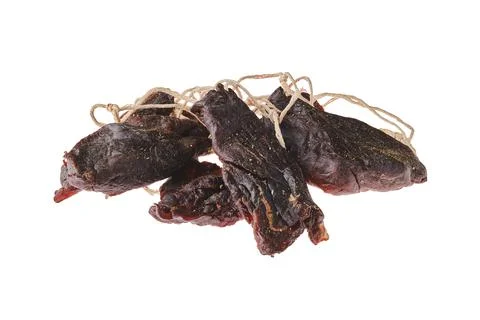 Overhead view of dried jerked deer or venison meat isolated on white backgrou Stock-Fotos