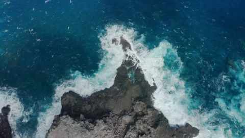 Overhead view, drone circling above people swimming in stormy blue Pacific ocean Stock Footage 147460058
