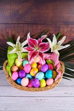 Overhead view of an Easter Basket with flowers and Easter Eggs Stock Photos