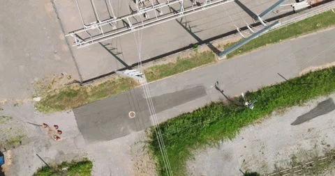 Overhead View Of Electrical Substation With Overhead Power Lines In Stock-Footage 249329572