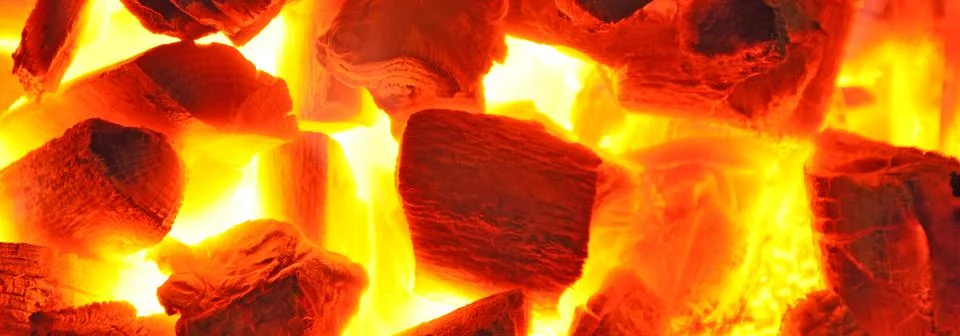 Overhead view of empty BBQ hot fire grill and burning charcoal Foto stock