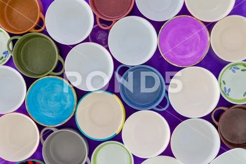 Overhead view of empty cups in a concept of hunger Stock Photos