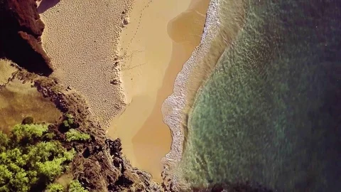 Overhead View Of An Empty Tropical Beach With Footprints In The Sand Stock-Footage 83959986