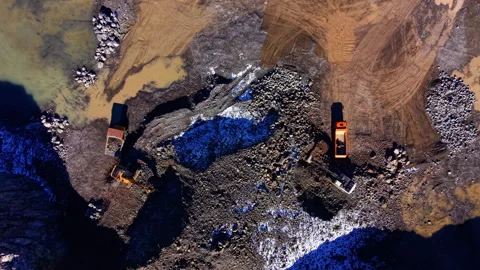 Overhead view of excavators loading dump trucks, Bulgaria Stock Footage 339012373