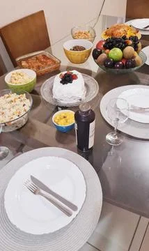 Overhead View of Festive Dinner Table Set with Plates and Dishes Stock Photos