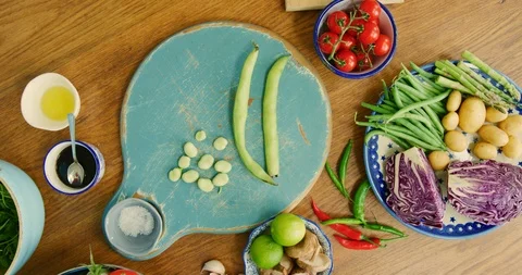 Overhead View Of Fresh Broad Beans On Cutting Board In Kitchen 4K Stock Footage 92481058