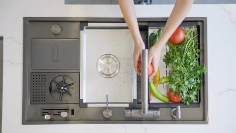 Overhead view of fresh vegetables in kitchen sink Stock Footage 336466168