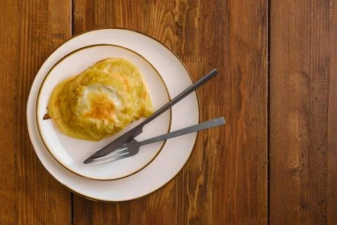 Overhead view of fried apple pancakes on a plate Stock Photos