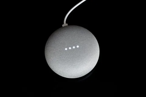 Overhead View Of A Google Home Mini With Cable Foto stock